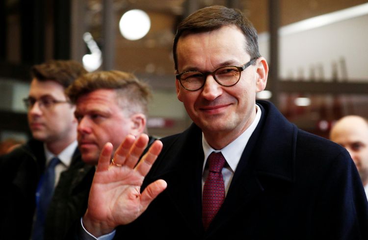 Poland's PM hopes economy will shrink by less than 4% this year