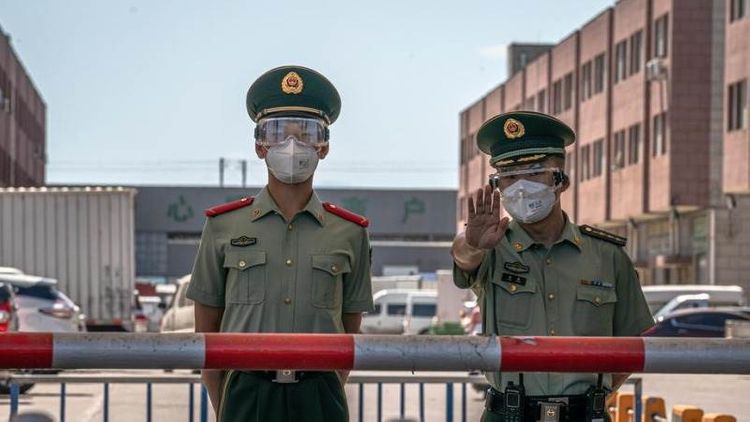 Beijing locks down 10 new neighborhoods over virus