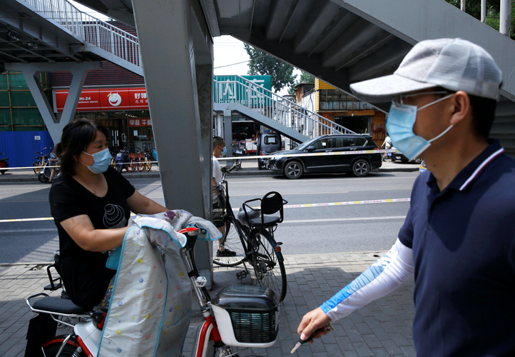 China reports 18 new coronavirus cases, nine in Beijing
