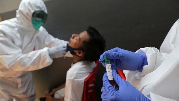 China reports 18 new cases, boosts testing in Beijing