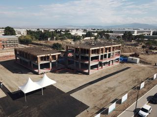President Ilham Aliyev views construction of residential complex by MIDA in Ganja