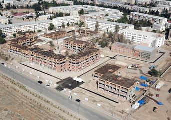 President Ilham Aliyev views construction of residential complex by MIDA in Ganja