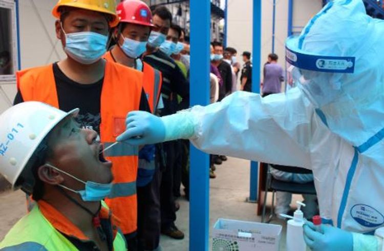 China sees uptick in new COVID-19 cases, including 17 in Beijing