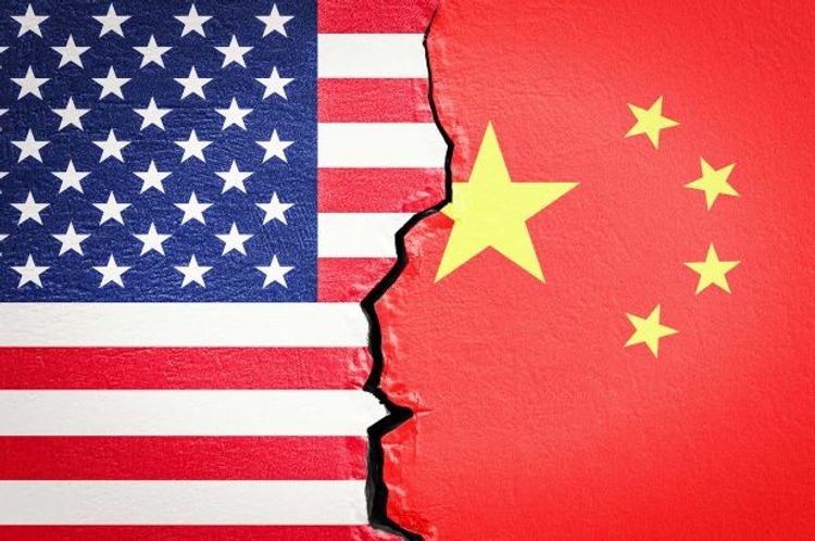China urges US to lift visa restrictions for officials