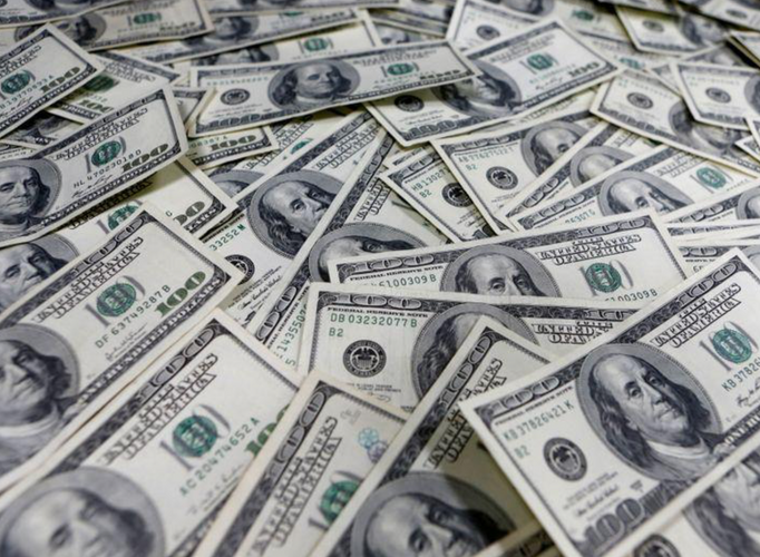 Dollar weakens after another surprise Fed rate cut