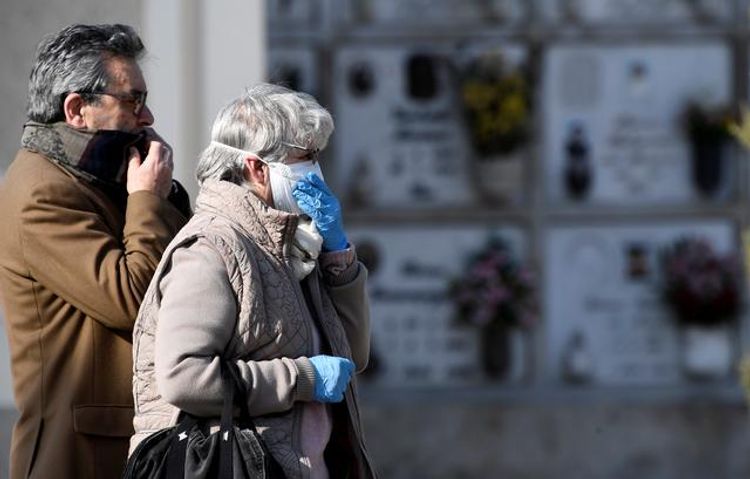 COVID-19 death toll in Italy rises by 889 to top 10,000