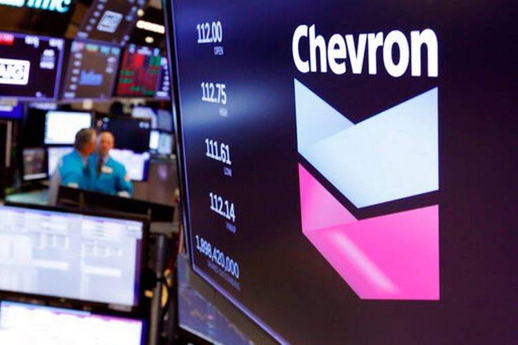 Chevron turns a profit but warns of pain ahead