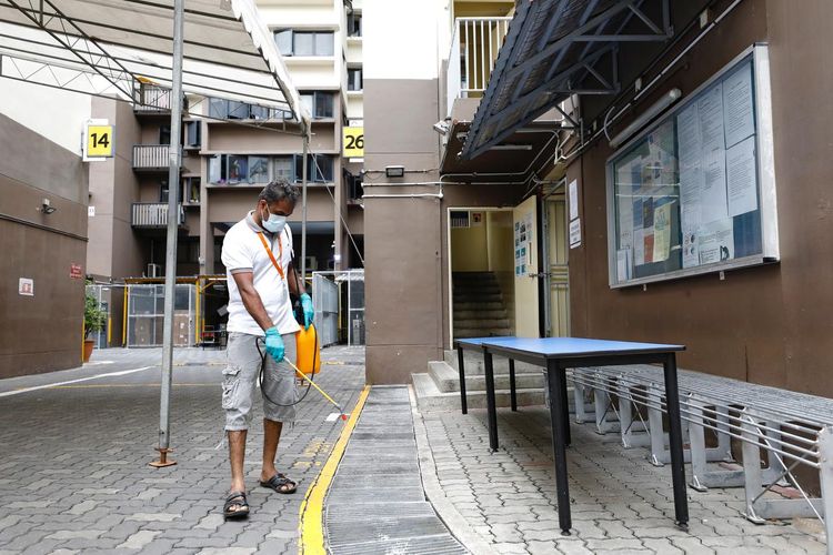 Singapore confirms 447 new coronavirus cases, smallest rise in two weeks
