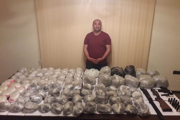 Azerbaijani border guards prevent smuggling of 115 kg of narcotic drugs and fire arms to country