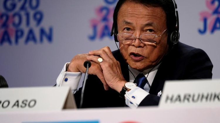 Japan finance minister says no tax cuts for time being to counter pandemic