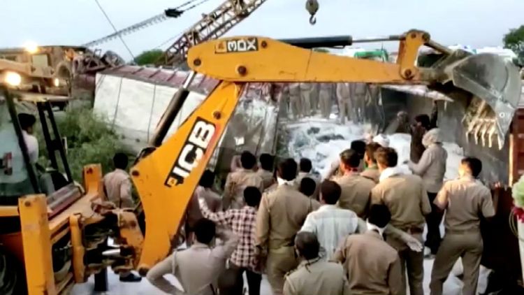 Caught in India's lockdown, 23 migrants die in truck crash going home