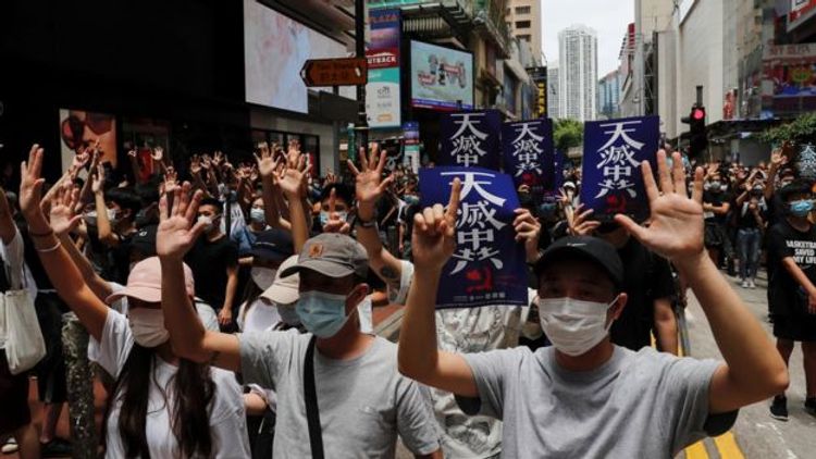 Hong Kong police fire tear gas as protesters decry China security law plan