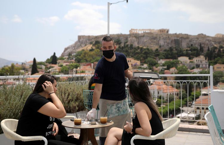 Greece reopens cafes, restaurants as summer season nears