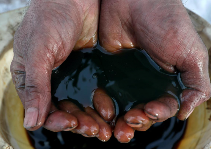 Oil slips on demand worries, Hong Kong tensions