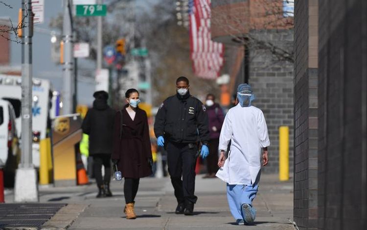 US COVID-19 death toll count tops 100,000