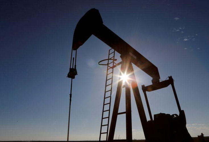 Oil falls as COVID-19 spike stokes fuel demand fears; still set for big weekly gain