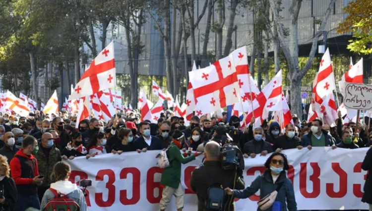 Opposition supporters start marching towards Parliament in Georgia
