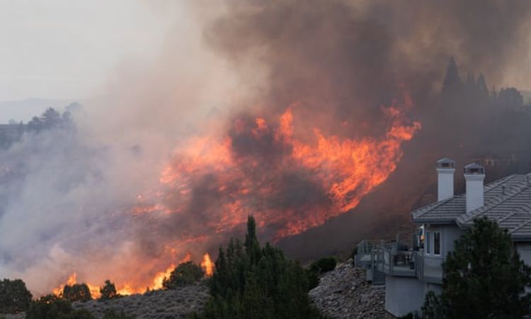 Fresh wildfires in Nevada and California force evacuations and kill at least one
