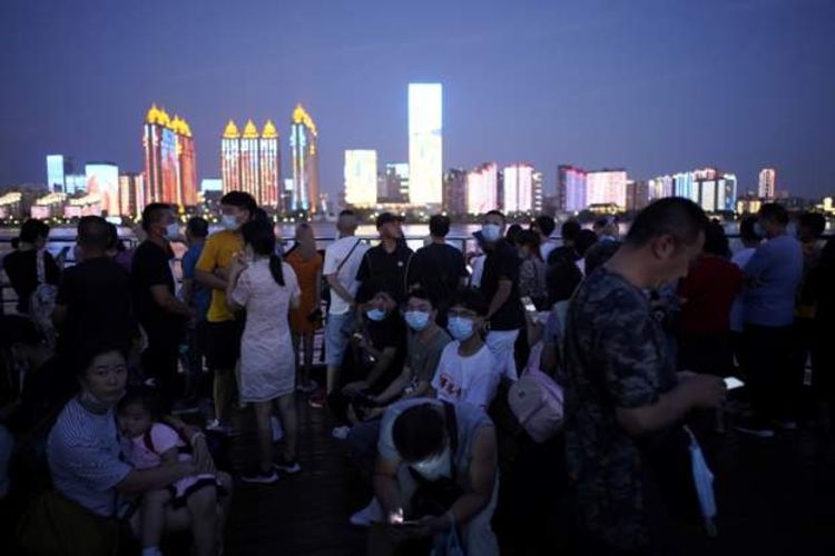 China will allow experts to probe virus origin, WHO says