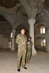 Azerbaijani President presents the Holy Quran brought from Mecca to the Agdam mosque