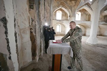 Azerbaijani President presents the Holy Quran brought from Mecca to the Agdam mosque