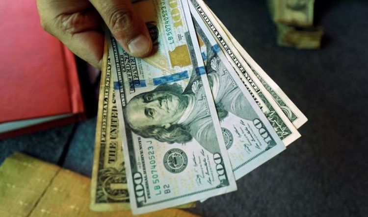 Dollar near a 3-month low ahead of Thanksgiving holiday