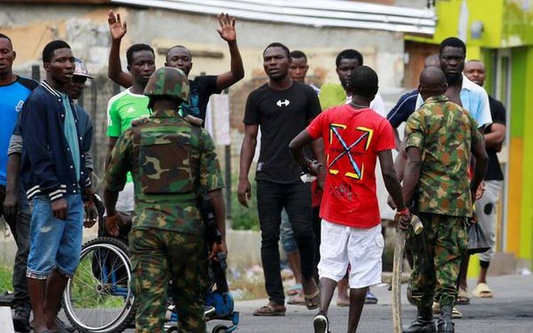 Nigerian police mobilize to quell worst unrest in two decades