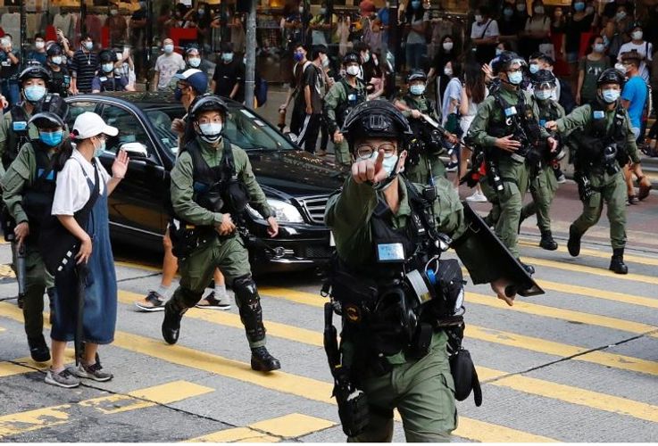 Hong Kong police fire pepper balls at protesters opposed to election delay, new law