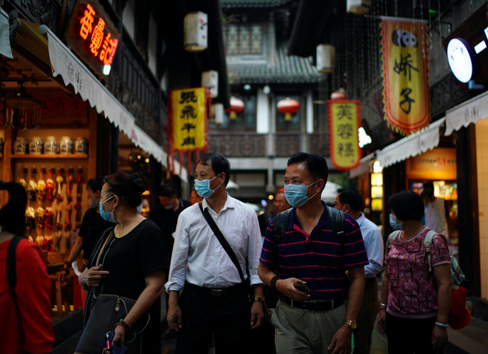 Mainland China reports seven new COVID-19 cases vs two a day earlier