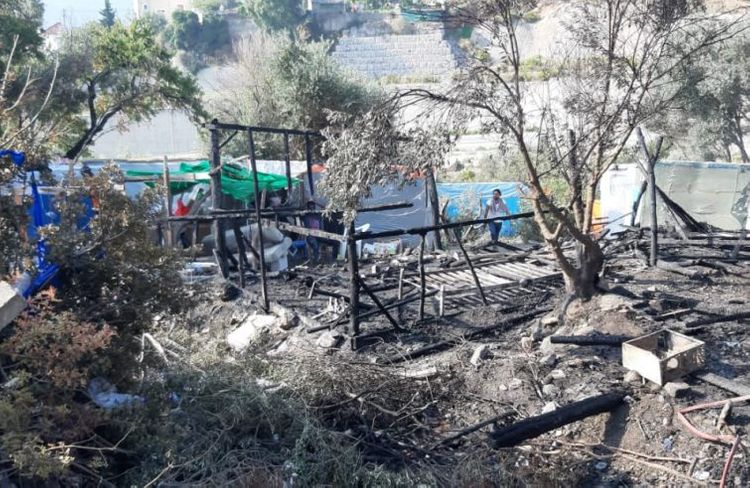 Fire breaks out near Greece's Samos migrant camp, facilities not at risk