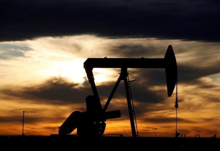 Oil eases as U.S. production returns after storm