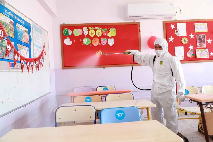 Some students back in classrooms as schools in Turkey partially reopen