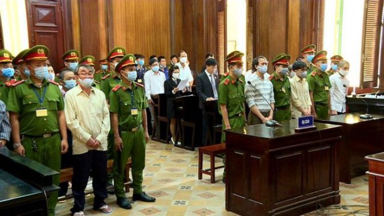 Vietnam jails 20 for terrorism over police station bombs