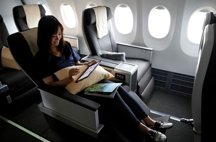 Singapore to trial business traveller pass as virus curbs ease