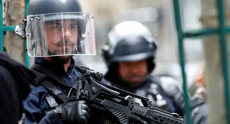 Four injured as machete-wielding man goes on stabbing spree near Charlie Hebdo's former HQ in Paris