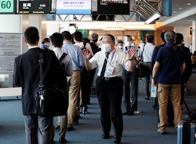 Japan's PM says foreign long-term visa holders can gradually enter from October