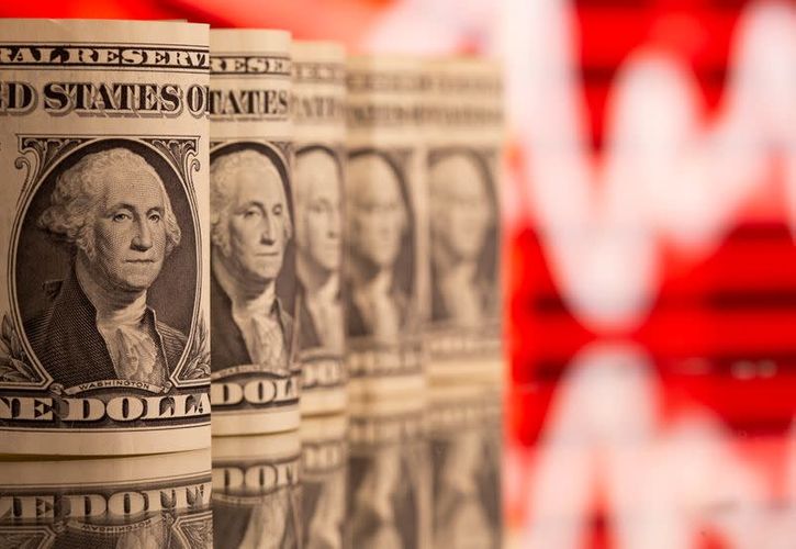 Dollar holds near multi-month high on U.S. growth bets