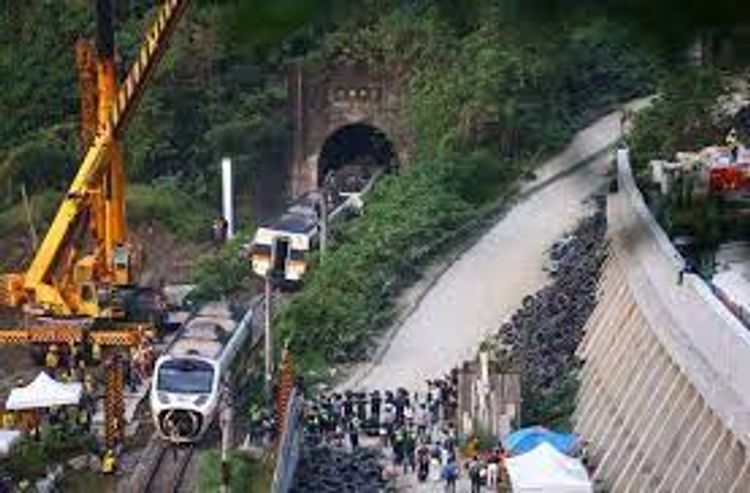 Taiwan prosecutors seek arrest warrant for suspect in deadly train crash
