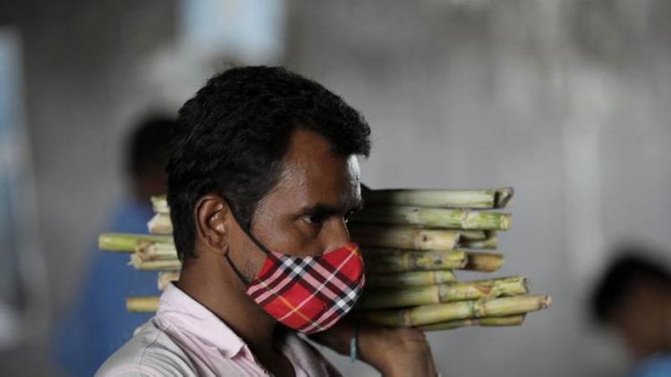 India logs record 115,736 COVID-19 cases