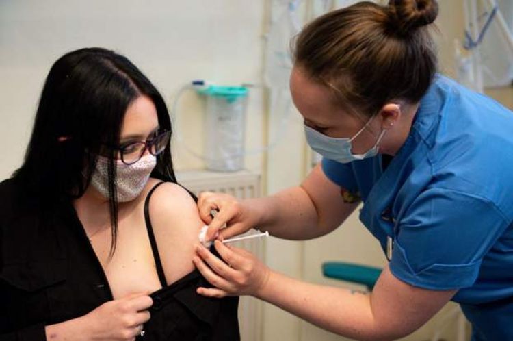 Carer is first person to receive Moderna vaccine in UK