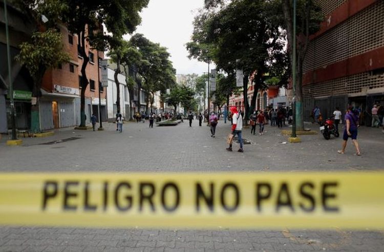 Venezuelan mayor marks homes of COVID patients with red symbol