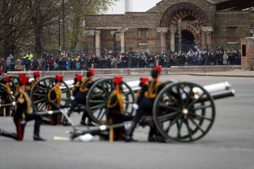 With artillery guns and flowers, Britain salutes Prince Philip