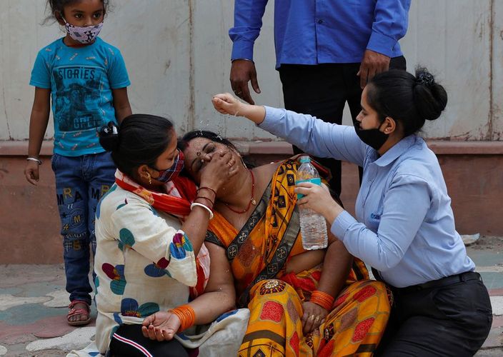 India reports another record daily rise in COVID-19 infections