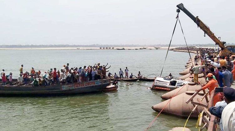 9 dead as vehicle falls into river in India's Bihar state