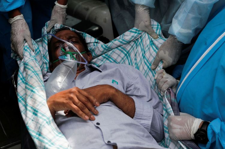 Hospitals overrun as India's COVID-19 infections top global record for second day