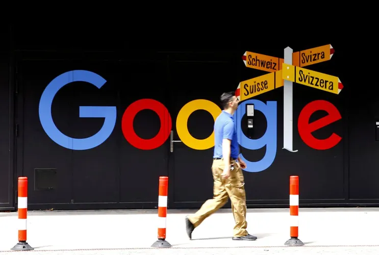 Alphabet sets profit record, plans $50 billion buyback