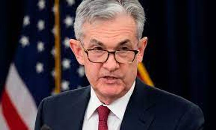 Fed holds interest rates near zero, sees faster growth and higher inflation