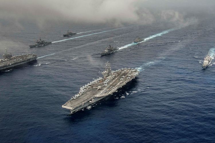 China urges U.S. to strictly restrain its warships, aircraft