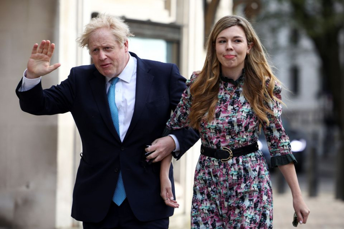 Britain's Prime Minister Boris Johnson and partner Carrie Symonds