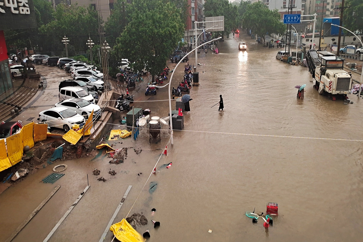 Death toll from flooding in China's Henan province rises to 302